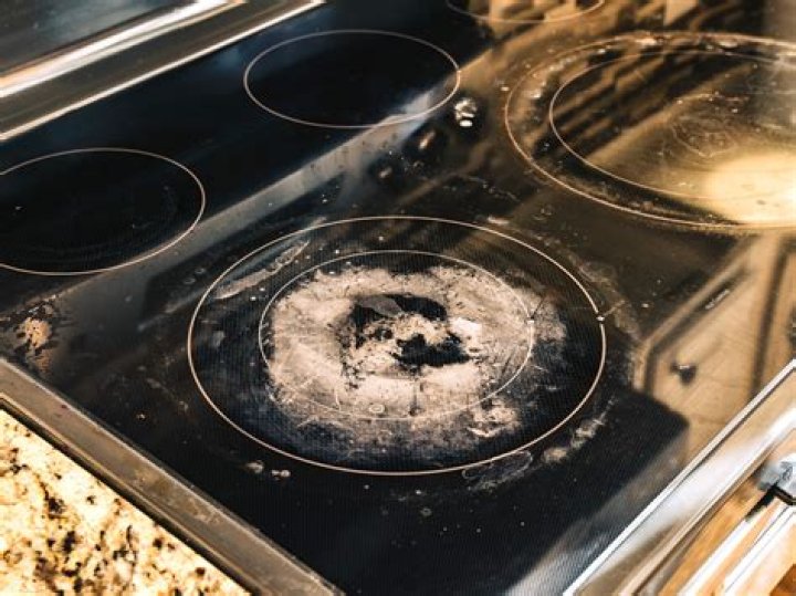 Can a chipped glass cooktop be repaired?